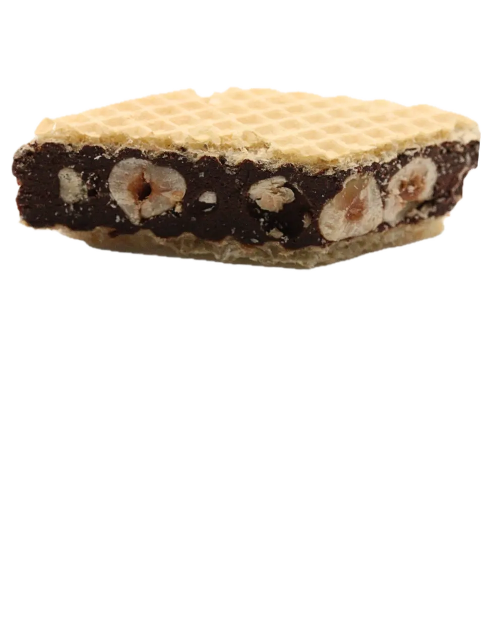 Close-up of a Dark Chocolate & Roasted Hazelnut Toroon showing whole hazelnuts in dark chocolate nougat between wafers
